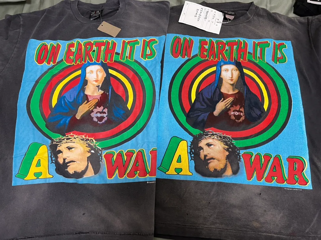 Printing and proofing SAINT MICHAEL SS TEE/ON EARTH/BLK Jesus, Mary and Infant Earth TEE Ready-made garments Aso special parts dyeing Washing and distressing Vintage craftsmanship Super complex and large-scale printing on the front and back Top purchasing technology